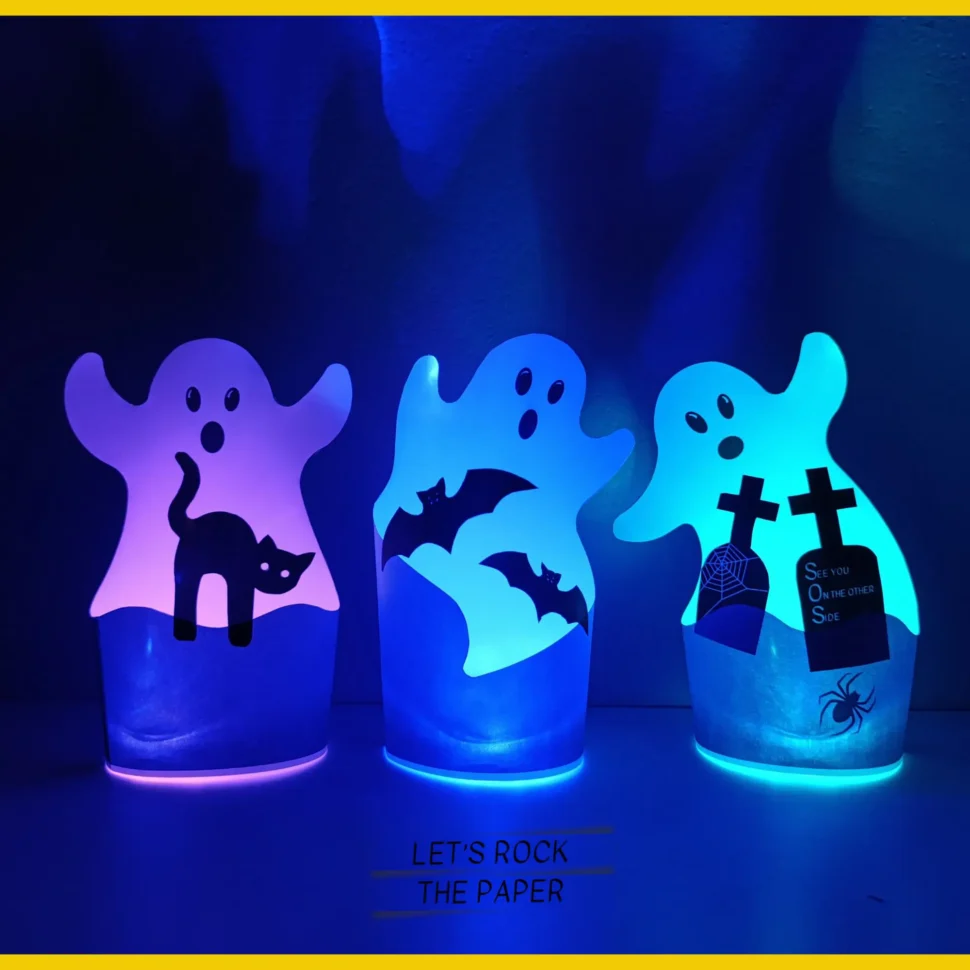 Tři svítící papírové duchy s halloweenskými motivy pro děti